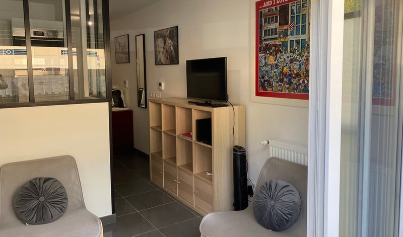 Photo 1: pièce à vivre