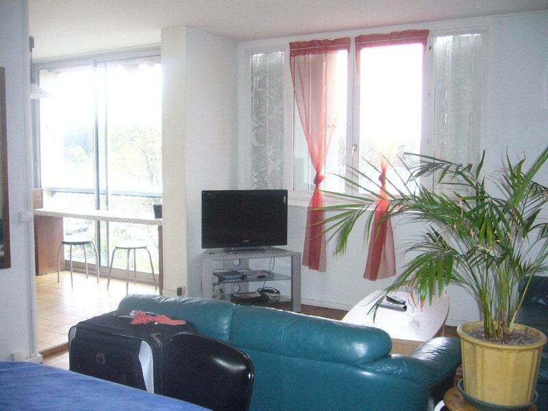 Photo 1: Le salon / salle à manger 