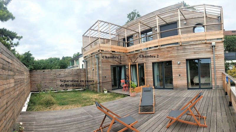 Photo 1: Vue d'ensemble de la maison à laquelle appartient l'appartement