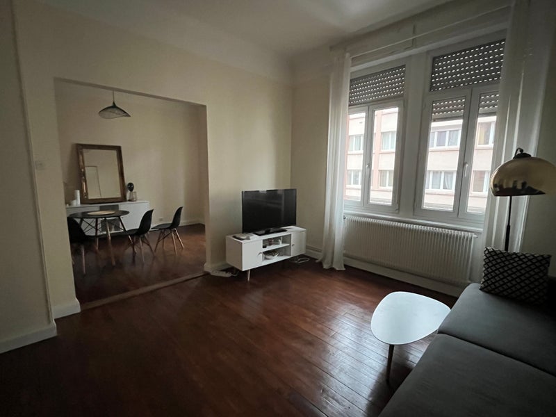 Photo 1: Salon/Salle à Manger