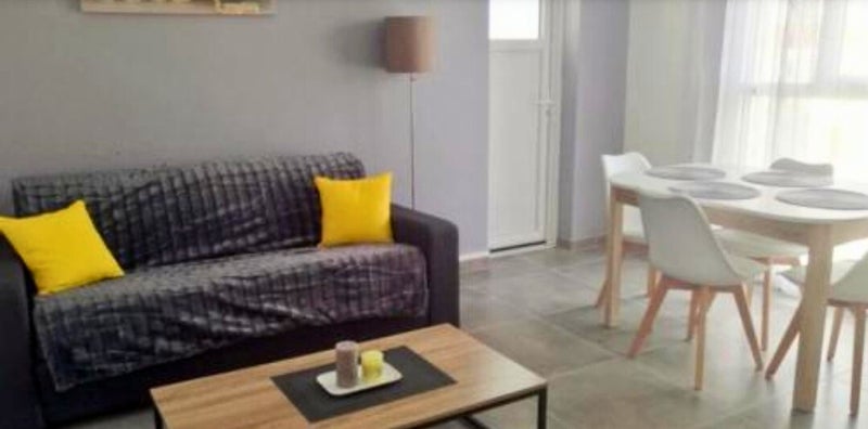 Photo 1: Salon - Salle à manger 