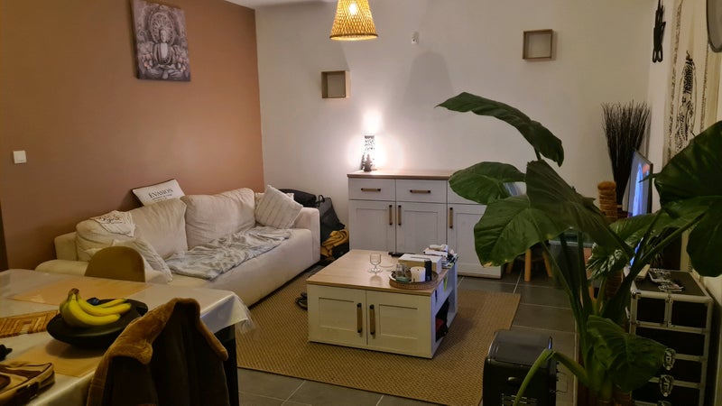 Photo 1: Le salon au rez de chaussee