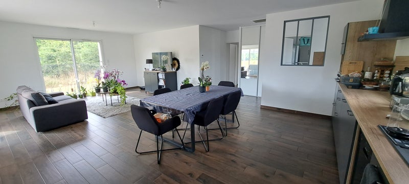 Photo 1: Cuisine ouverte sur le séjour