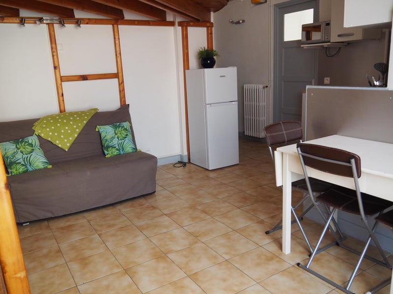 Photo 1: Pièce à vivre