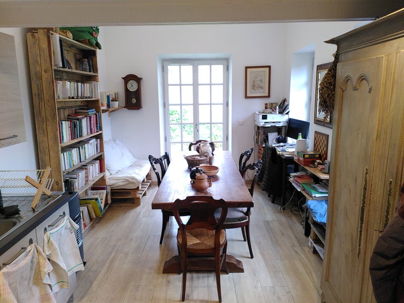 Photo 1: Salon/salle à manger