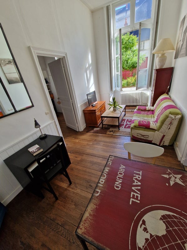 Photo 1: Salon salle à manger